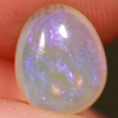 SOLID CRYSTAL OPAL Transparent with soft purple throughout